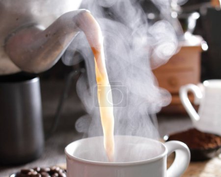 Photo for Hot coffee with steam in the background - Royalty Free Image