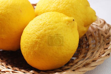 Photo for Fresh lemon in basket - Royalty Free Image