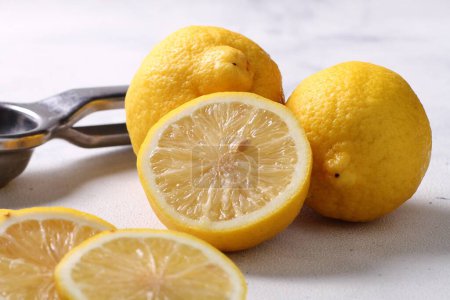 Photo for Fresh lemons on a cutting board - Royalty Free Image