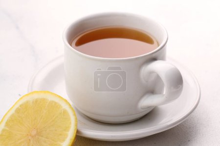 Téléchargez les photos : Tasse de thé au citron - en image libre de droit
