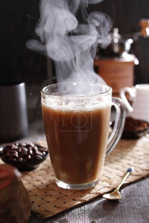Photo for A cup of coffee with steam rising out of it - Royalty Free Image