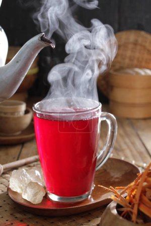 Foto de Una taza de té con un vapor saliendo de ella - Imagen libre de derechos