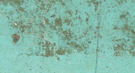 Photo for A green wall with a rusted surface - Royalty Free Image