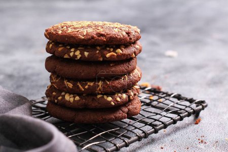 Photo for A stack of cookies on a cooling rack - Royalty Free Image