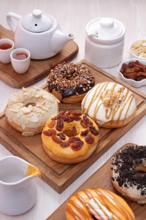 Photo for Various types of donuts with coffee - Royalty Free Image