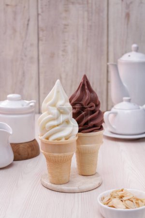 Photo for Ice cream and cup of tea on table - Royalty Free Image