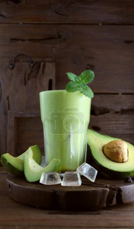 Photo for Fresh green smoothie with avocado and lime - Royalty Free Image