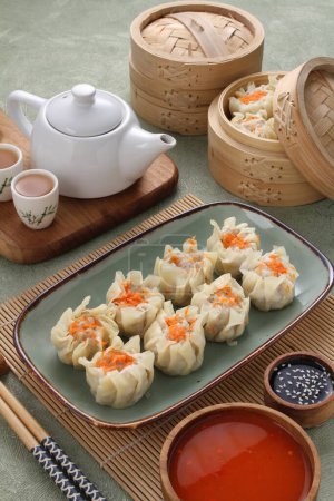 Photo for Asian dumplings with soy sauce and vegetables - Royalty Free Image