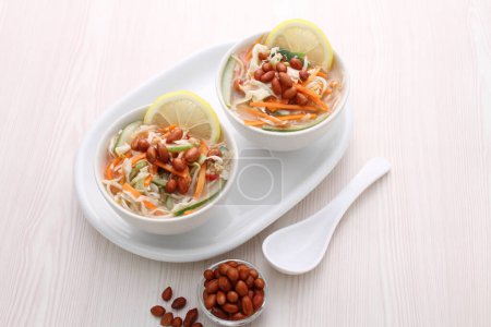 Photo for Bowl with tasty rice noodles on table - Royalty Free Image
