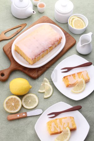 Photo for Lemon cake with fresh lemon slices on plate - Royalty Free Image