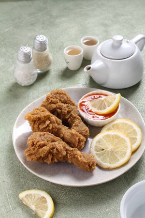 Photo for Fried chicken with lemon and spices - Royalty Free Image