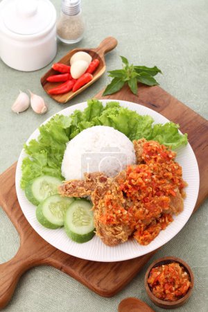 Photo for Fried chicken with rice, vegetables and spices - Royalty Free Image