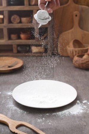 Photo for Making flour on wooden surface - Royalty Free Image