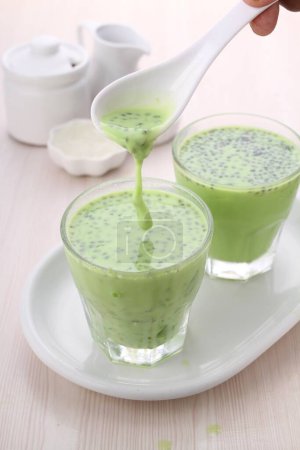 Photo for Matcha green tea in a glass - Royalty Free Image