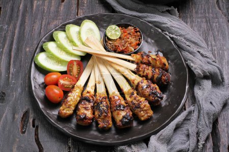 Photo for Grilled kebab, barbecue with grilled pork, tomato and onion - Royalty Free Image