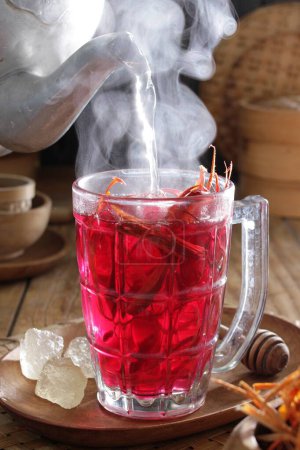 Photo for Hot red hot drink with spices - Royalty Free Image