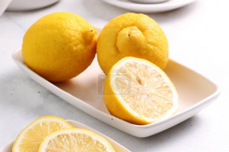 Photo for Fresh ripe lemon on the table - Royalty Free Image