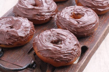 Photo for Chocolate donuts with chocolate topping - Royalty Free Image