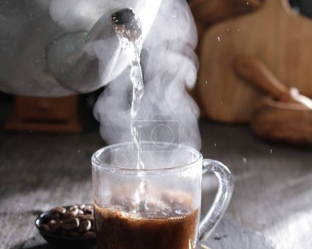 Téléchargez les photos : Grains de café dans la tasse - en image libre de droit
