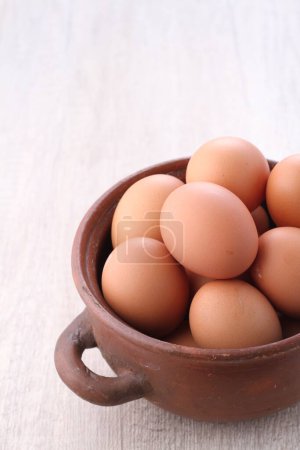 Photo for Eggs on wooden background - Royalty Free Image