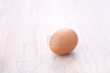 Photo for Egg on wooden background - Royalty Free Image