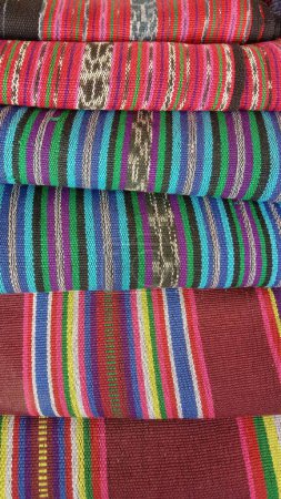 Tais weaving in Timor Leste, symbolizing freedom and cultural identity. The traditional textile is vital for Timorese life, used for decoration and clothing styles for men and women.