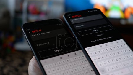 Foto de Sharing Netflix password on ipad,TV and Android phone. Sydney, 4 February 2023. - Imagen libre de derechos