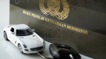 Téléchargez les photos : BPKB and STNK is a motor vehicle sertificate proof. Jakarta, 16 February 2023 - en image libre de droit