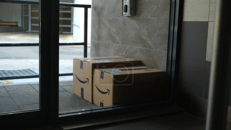 Photo for 2 boxes of packages delivered from amazon at the door. Sydney, 25 June 2023. - Royalty Free Image