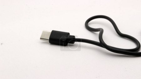 Type C data cable is black, white background. the newest technology after ordinary data cables.
