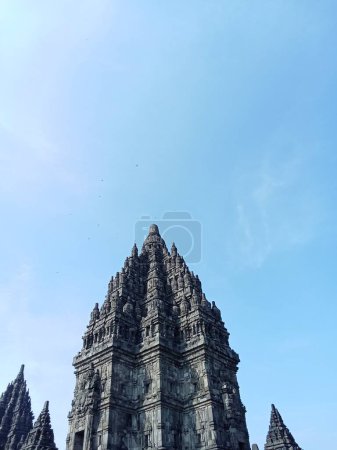 View of Prambanan temple with bright blue clouds