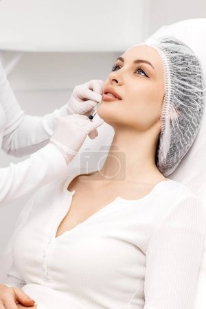 Photo for Lip Augmentation. Woman Getting Beauty Injection For Lips - Royalty Free Image