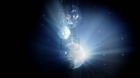 Photo for A colorful disco mirror balls illuminates the backdrop of a nightclub. The party lights up the disco ball. - Royalty Free Image