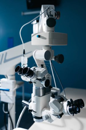 Photo for Ophthalmic laser system in eye surgery clinic. Laser treatmnet for myopia. The ophtalmology medical equipment. Eyes examination. Modern device. Laser eye vision correction - Royalty Free Image