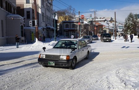Photo for Otaru, Japan  - December 19, 2022 : Snow-covered streets of Otaru. Otaru is popular tourist attractions in Hokkaido,Japan - Royalty Free Image