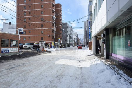 Photo for Hokkaido, Japan  - December 20, 2022 : Snow-covered streets of Sapporo. Sapporo downtown is popular tourist attractions in Hokkaido,Japan - Royalty Free Image