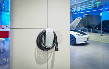 Photo for KUALA LUMPUR, MALAYSIA - NOV 13, 2023: Tesla charging in newly opened Pavilion Damansara Heights showroom - Royalty Free Image