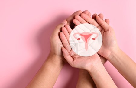 Photo for People holding virtual uterus icon reproductive system, Woman health care service, Healthy lifestyle, Disease of female organs, Human anatomy, Health care and hospital service, Healthy female - Royalty Free Image