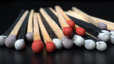 Photo for Mixed-colored matchsticks with black background - Macro shoot - Royalty Free Image