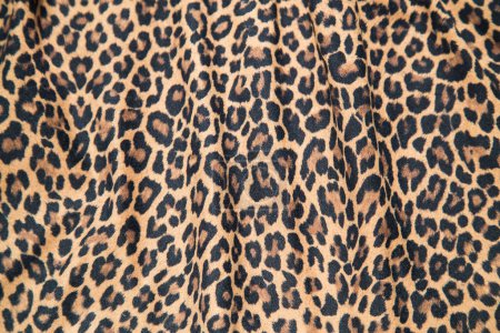 Foto de Patrón de safari de textura de fondo de leopardo diseño de material de tela de impresión de leopardo. - Imagen libre de derechos