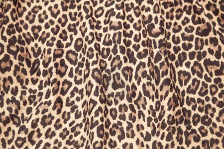 Foto de Patrón de safari de textura de fondo de leopardo diseño de material de tela de impresión de leopardo. - Imagen libre de derechos