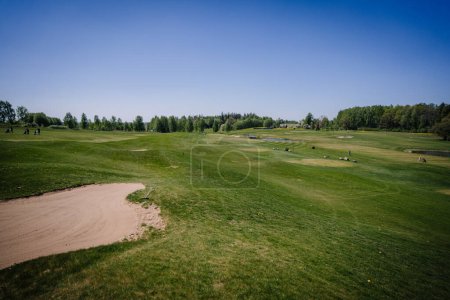 Photo for Golf course in spring in sunny weather - Royalty Free Image