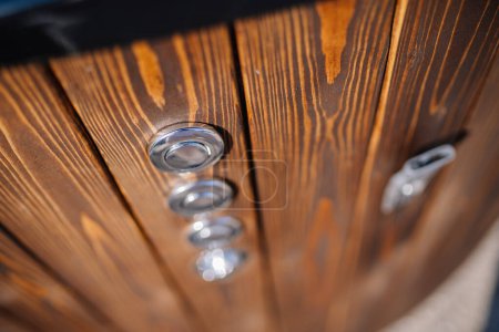 Photo for Outdoor wooden hot tub button close up - Royalty Free Image