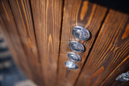 Photo for Outdoor wooden hot tub button close up - Royalty Free Image