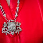 necklace on a women on a red background, republic of Latvia