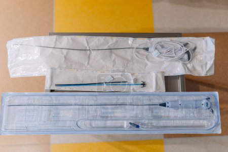 Photo for Valmiera, Latvia - March 20, 2024 -Sterile urology surgical instruments laid out on a tray, including catheters and endoscopic equipment, ready for a procedure. - Royalty Free Image