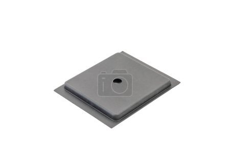 Gray square cardboard plate with cutout and hole, possibly computer case blank or hardware mounting bracket, isolated on white background.