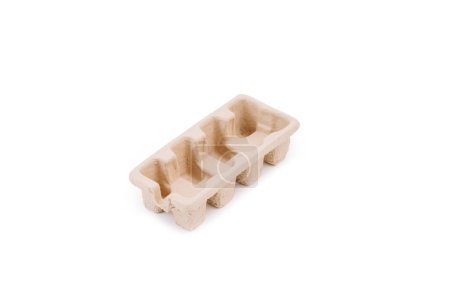A molded paper pulp packaging piece, typically used for securing items during shipping, isolated on a white background.