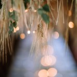 Valmiera, Latvia - August 10, 2023 - Close-up of wheat and leaves decor with soft focus and bokeh lights.