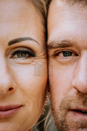 Photo for Valmiera, Latvia - August 10, 2023 - Close-up of a bride and groom's eyes, foreheads touching, showing intimacy and love. - Royalty Free Image